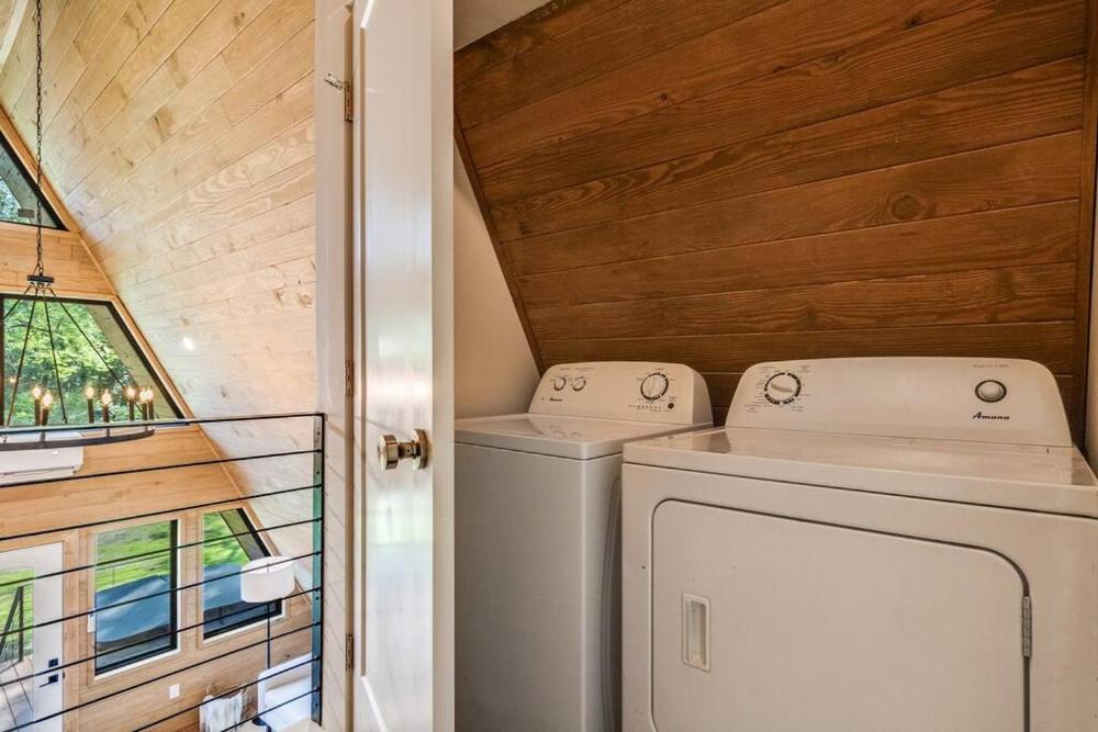 Modern A-Frame Cabin by Rip Van Winkle with Hot Tub